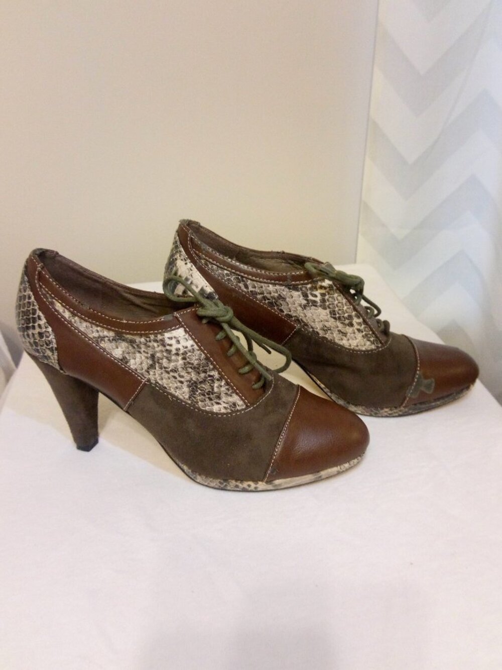 Brown snake print women booties size 8.5